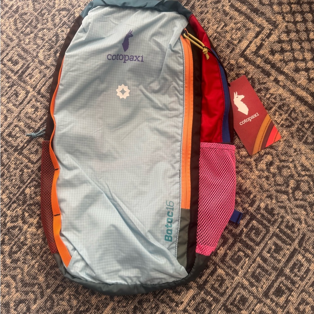 Cotopaxi Bataan 16L Del Día Backpack with Blue and Red Accents